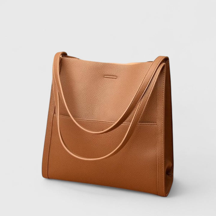 Πλουσία – Skuldertaske i læder med enkelt og elegant design
