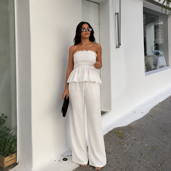 Nuria - Conjunto top strapless fruncido con volante y pantalón palazzo de lino